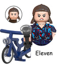 Mini-bouwfiguur Stranger Things Eleven en haar blauwe fiets