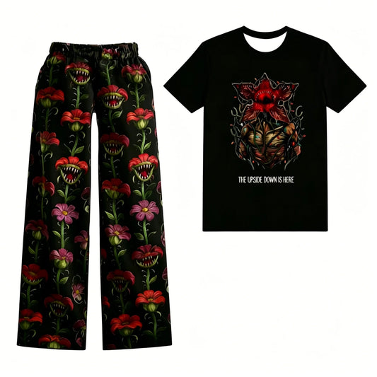 Stranger Things-damespyjama met zwart T-shirt met Demogorgon van bloemen en broek met vleesetende bloemen